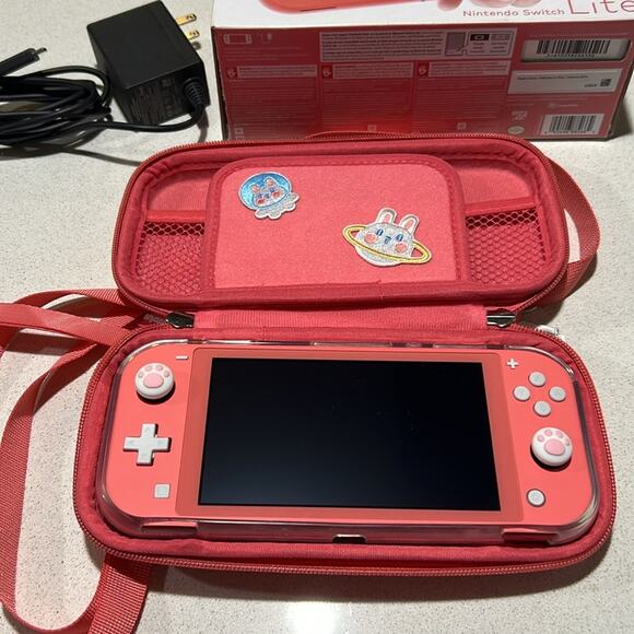 Nintendo Switch Lite Coral Handheld Console - Picture 12 of 12